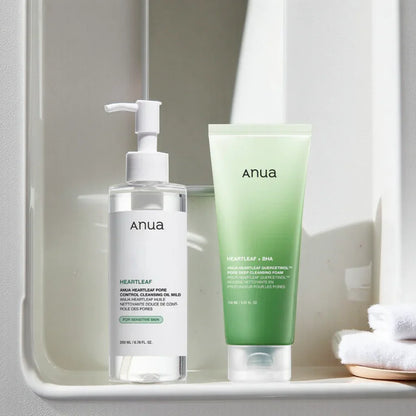 Anua Double Cleansing Duo Set combining heartleaf cleansing oil and quercetinol cleansing foam for deep pore purification.