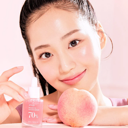 Anua Peach 70% + Niacinamide 5% Serum gently clearing dead skin cells with a specialized peach yogurt complex.