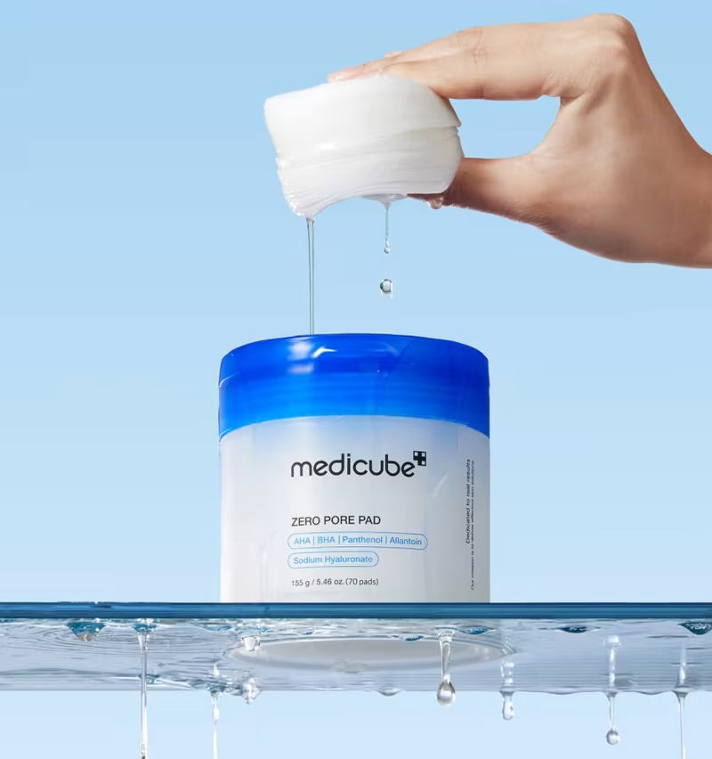 Medicube Zero Pore Pad exfoliating the skin and removing dead cells.