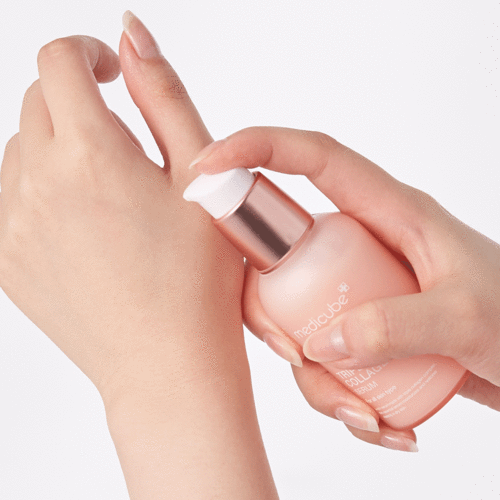 Medicube Collagen Booster Kit gently exfoliating dead skin cells and refining pores with Zero Pore Pads 2.0.
