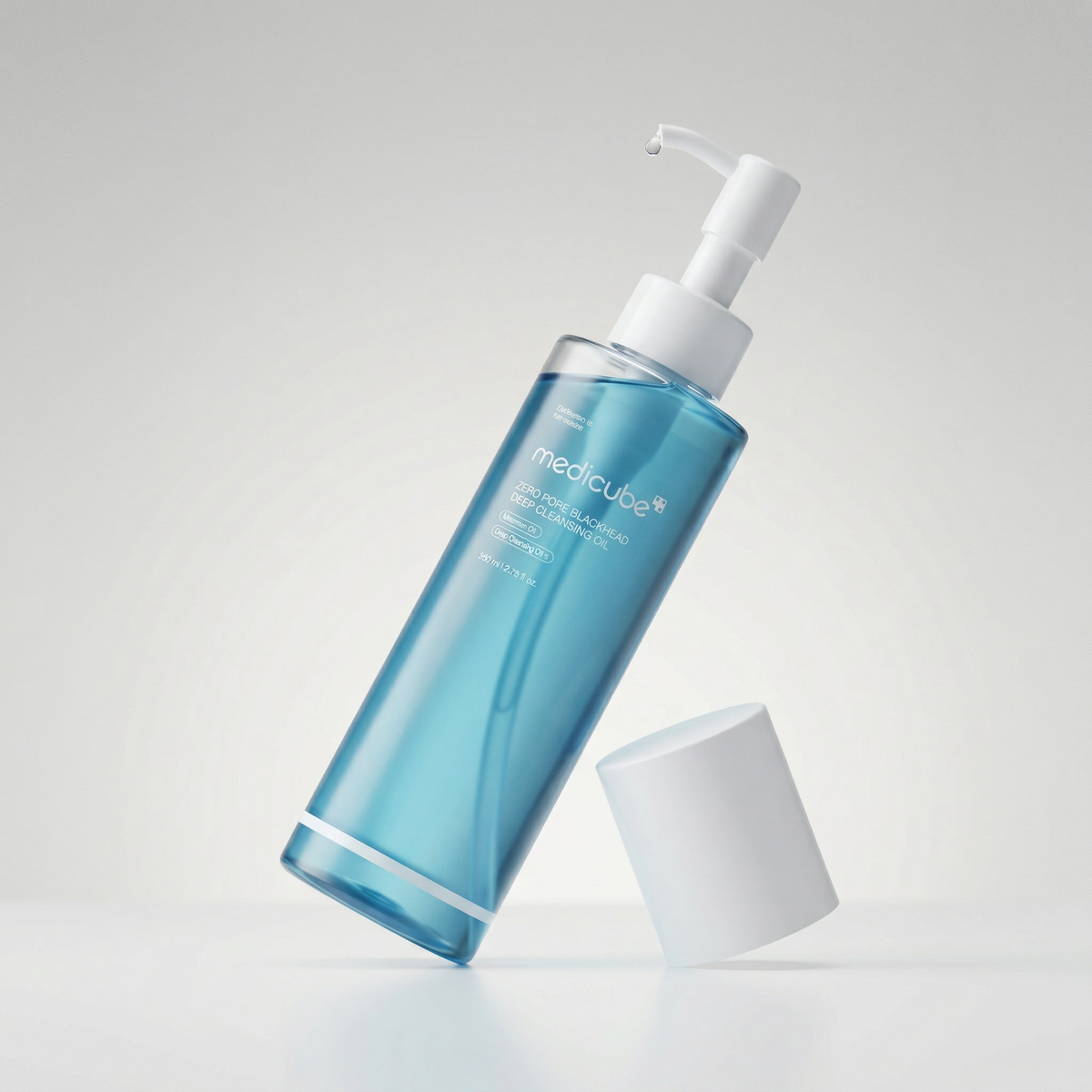 Medicube Zero Pore Blackhead Cleansing Oil combining 90.6% botanical oils with gentle LHA for deep pore care.