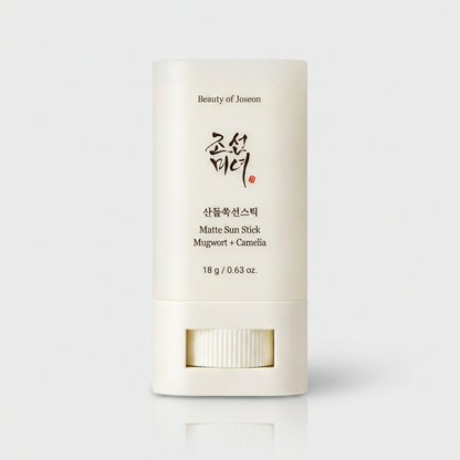 Beauty of Joseon Mugwort & Camellia Matte Sunscreen Stick protecting and perfecting the skin on the go.